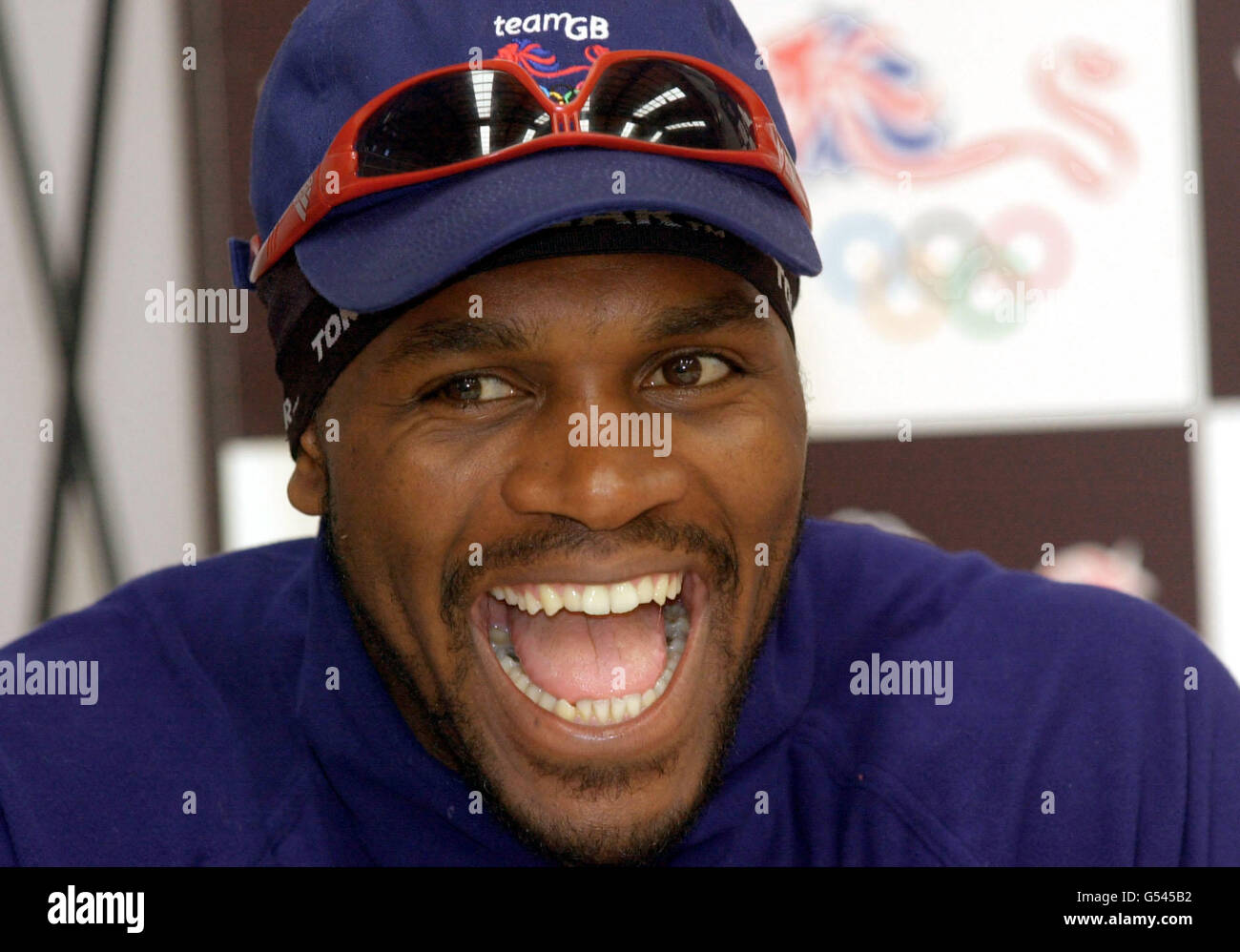 Sport boxing sunglasses on cap mouth open laughing audley harrison hires stock photography and