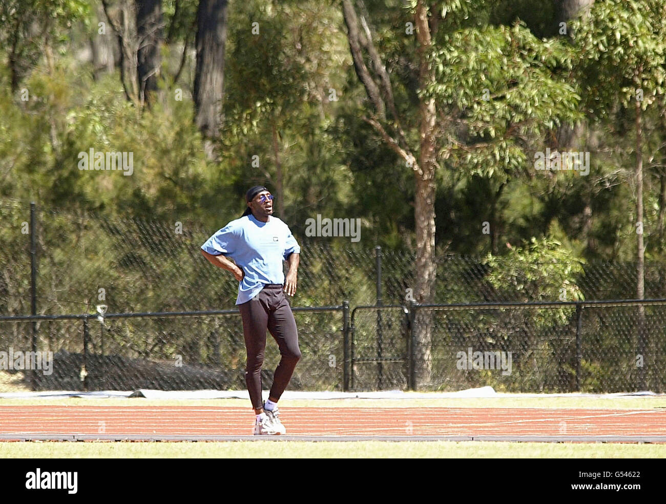 Linford Christie walks on the track at the Great Britain Training Camp on the Gold Coast of Australia. Stock Photo