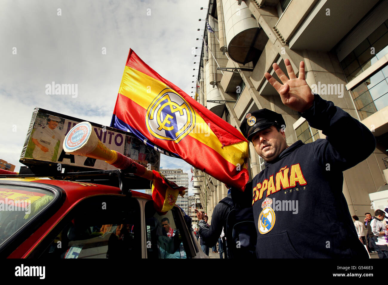 Soccer - UEFA Champions League - Semi Final - Second Leg - Real Madrid v Bayern Munich - Santiago Bernabeu. A Real Madrid fan outside the Santiago Bernabeu stadium before the match with his decorated car in club colours Stock Photo