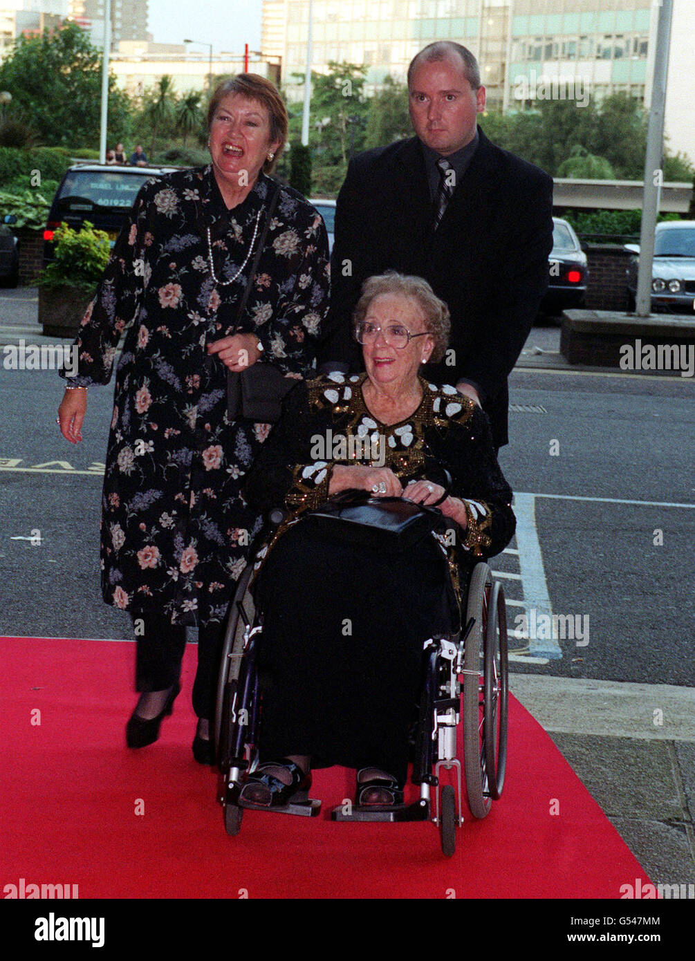 Celebrity wheelchair elderly arriving hi-res stock photography and images -  Alamy
