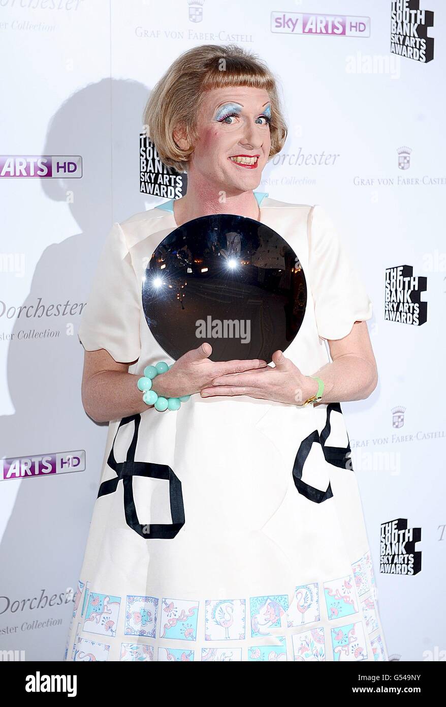 Grayson Perry with the Visual Art award at the 2012 South Bank Sky Arts Awards at the Dorchester Hotel, Park Lane, London Stock Photo