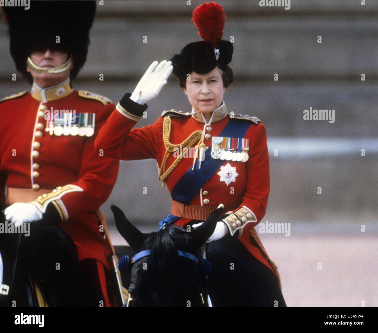 Queen Elizabeth II takes the salute of the Household Guards regiments during the Trooping of the