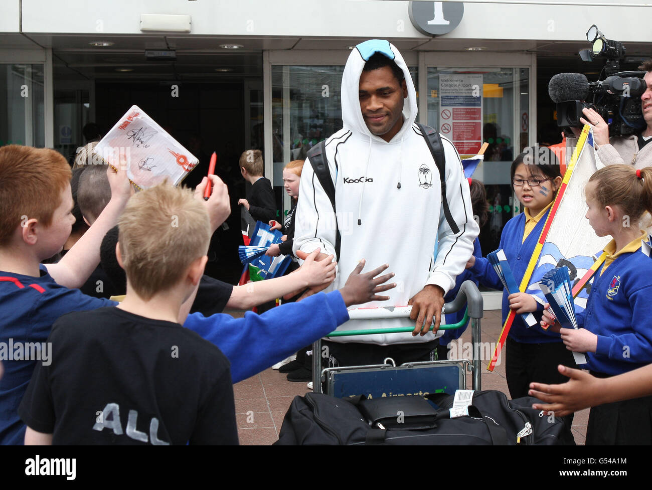 Rugby Union - Glasgow Sevens - International Teams Arrive - Glasgow Airport. Members of the Fiji rugby 7s teams arrive at Glasgow airport, Glasgow. Stock Photo