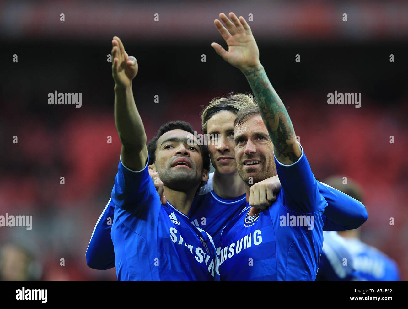 Soccer - FA Cup - Final - Liverpool v Chelsea - Wembley Stadium. Chelsea's Jose Bosingwa, Fernando Torres and Raul Meireles (left to right) celebrate at the final whistle Stock Photo
