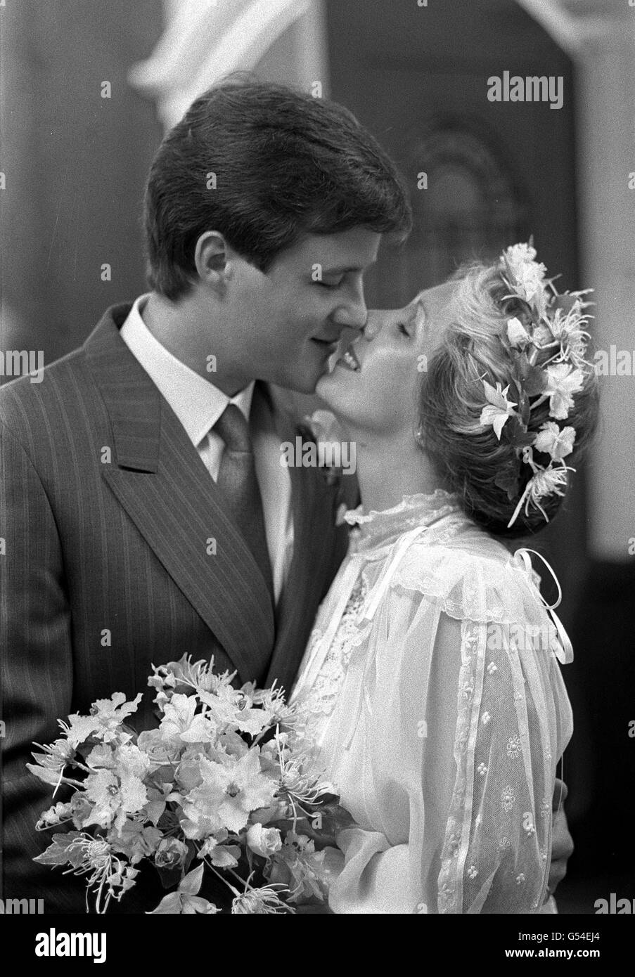 PA Photo 22/6/1985 Actor Ian Sharrock with his bride TV publicity girl Pamela McDonald after their wedding ceremony at Leeds Roman Catholic Cathedral Stock Photo