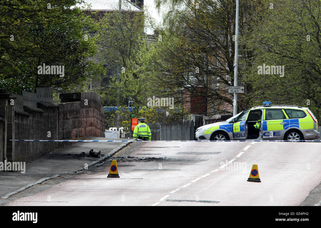 Police close to where a burnt out pickup truck was left on Bonkle Road