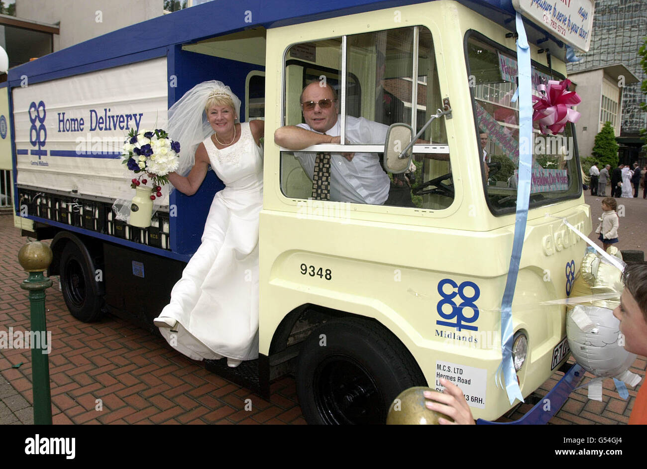 Milkman Barry Britton beats the fuel shortage by delivering his sister Patrica Mountney to her wedding by milk float at Birmingham Registry Office. Fuel shortages meant that the limousine company originally hired could not guarantee a car. * and that's where Barry stood-in, ensuring that the wedding between his sister Patricia and John Stevens could go ahead. Stock Photo