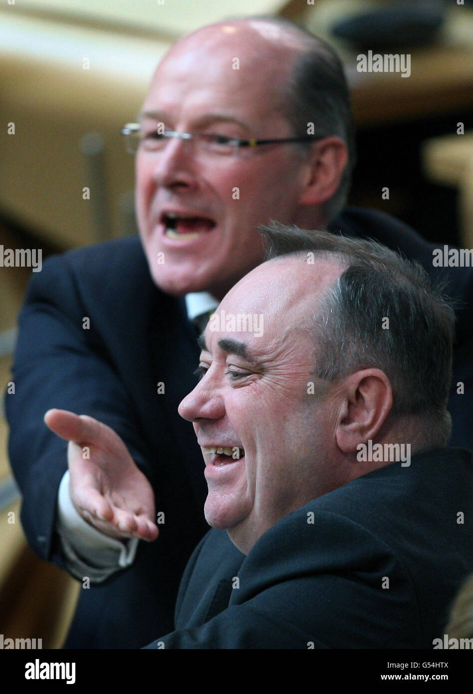 Scottish First Minister Alex Salmond (right) during First Minister's Questions at the Scottish Parliament in Edinburgh today. Stock Photo