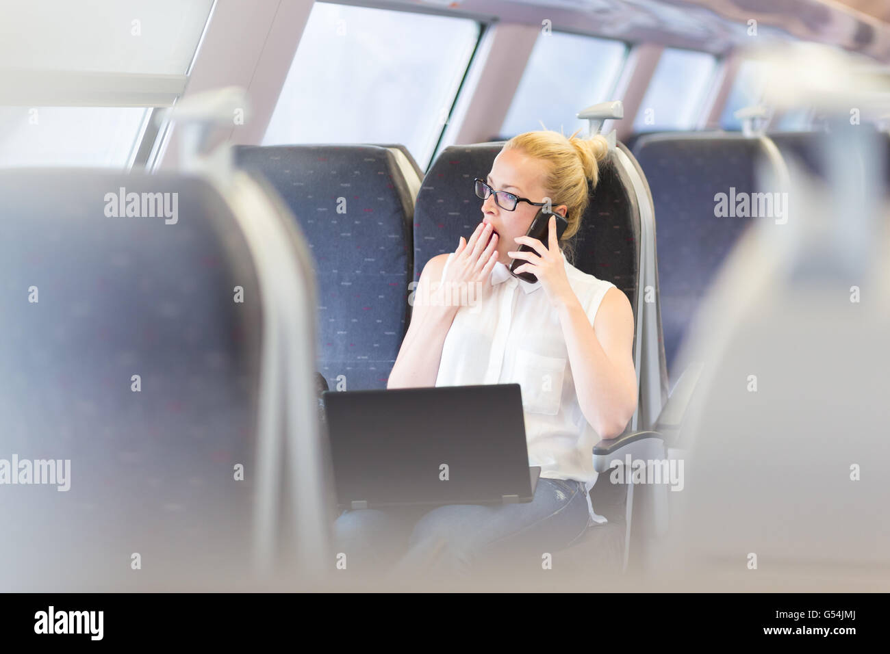 Tired woman on the subway train hi-res stock photography and images - Alamy