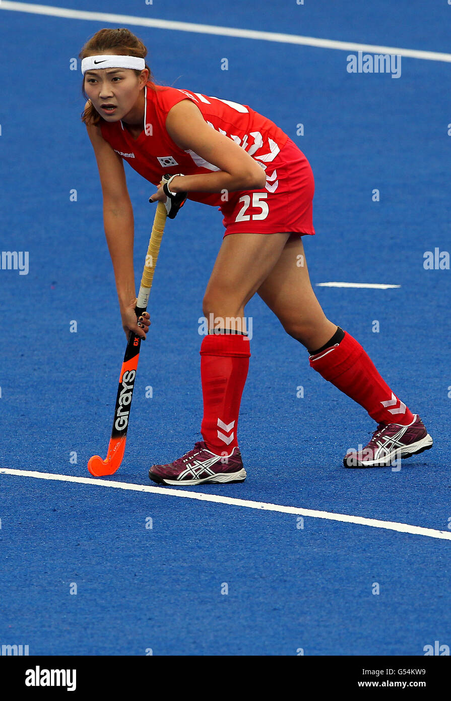 Korea's Hyelyoung Han in action against Argentina during the Visa International Invitational Hockey Tournament at the Riverbank Arena, London. Stock Photo