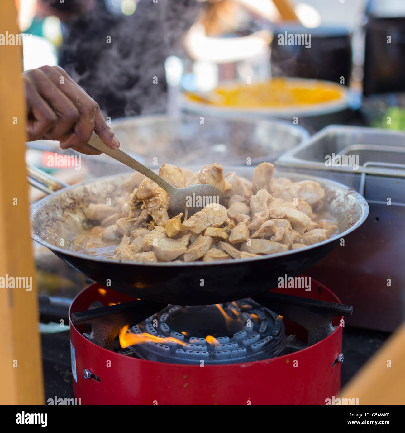 Cheff cooking on outdoor street food festival Stock Photo Alamy