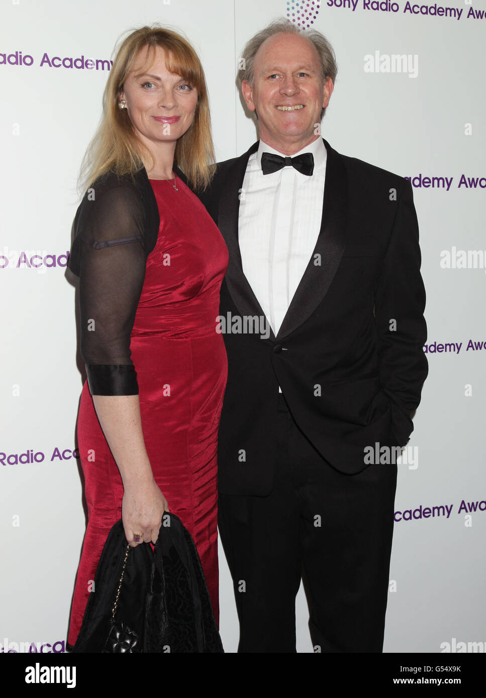 Peter Davison and wife Elizabeth Morton arriving for the Sony Radio Academy Awards, at the Grosvenor House hotel in central London. PRESS ASSOCIATION Photo. Picture date: Monday May 14, 2012. Photo credit should read: Yui Mok/PA Wire Stock Photo