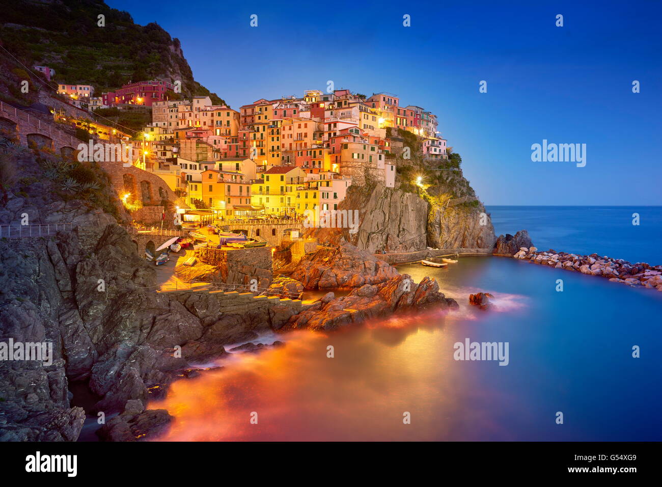 Manarola at evening night, Cinque Terre National Park, Liguria, Italy, UNESCO Stock Photo