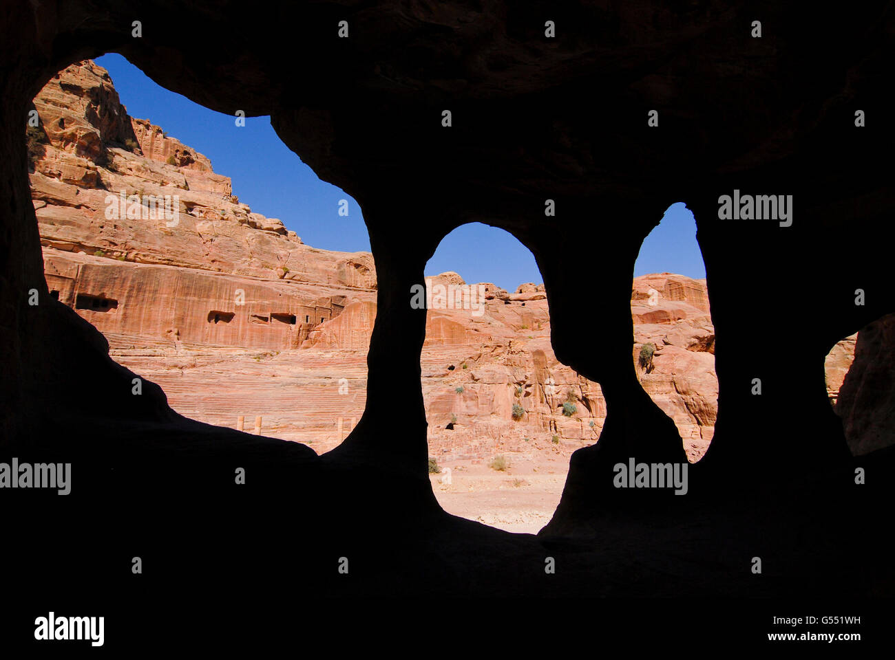 JORDAN, UNESCO world heritage archaeological site Petra, originally known as Raqmu to the Nabataeans, cave in sand stone / JORDANIEN, historische Nabataeer Stadt Petra, Hoehle im Sandstein Stock Photo