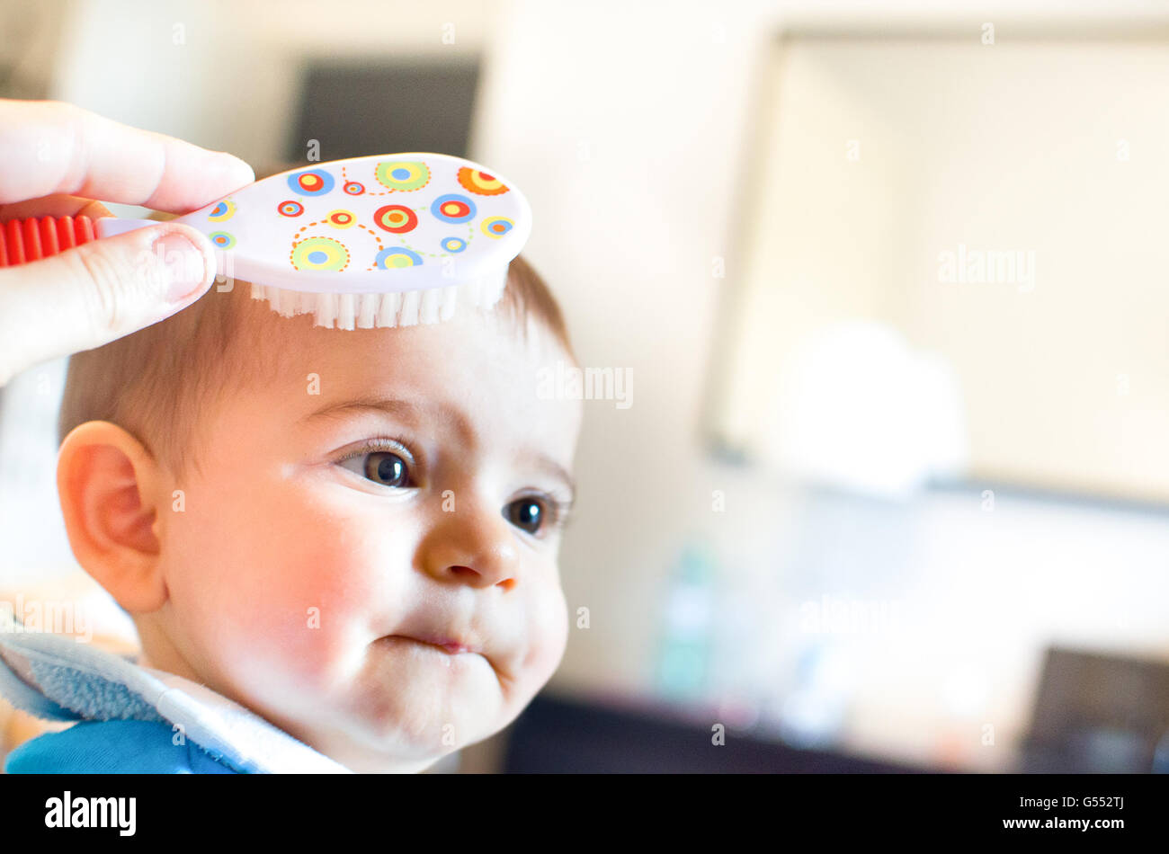 baby hairbrush newborn Stock Photo