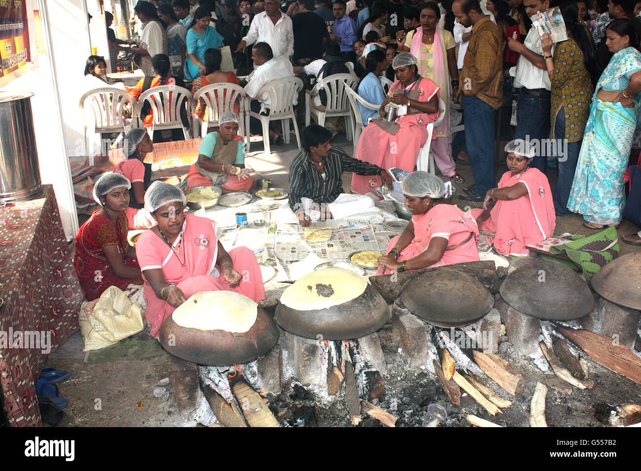 PUNE MAHARASHTRA INDIA OCT 24 Cooks Prepare Traditional Indian Food pune-maharashtra-india-oct-24-cooks-prepare-traditional-indian-food