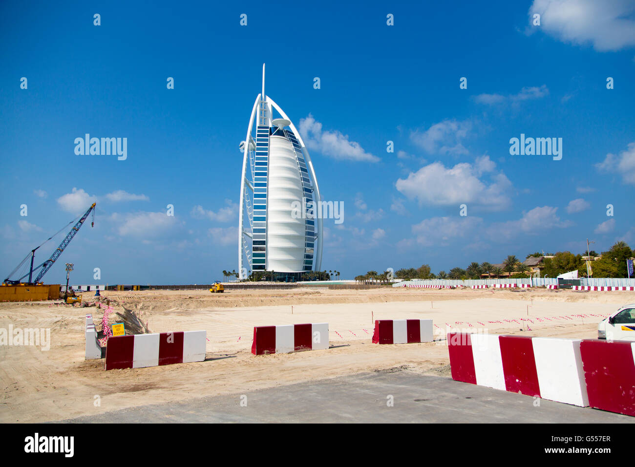 DUBAI, UAE - JANUARY 16, 2014: Burj Al Arab hotel in Dubai. The complex stands on an artificial island and is connected to the m Stock Photo