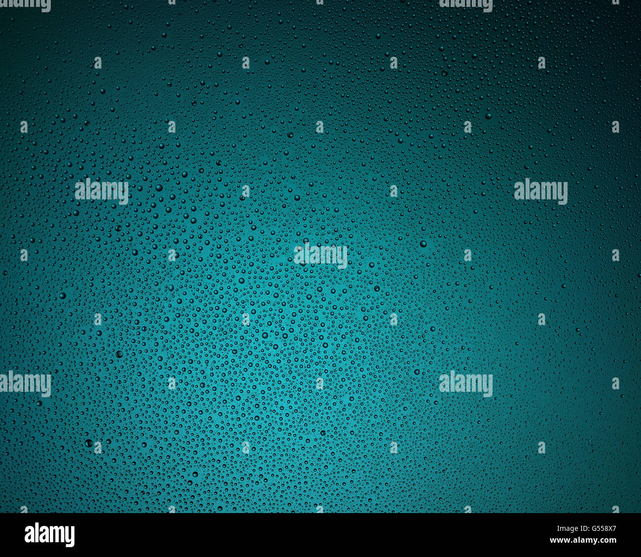 Blue water drops on the glass background Stock Photo - Alamy