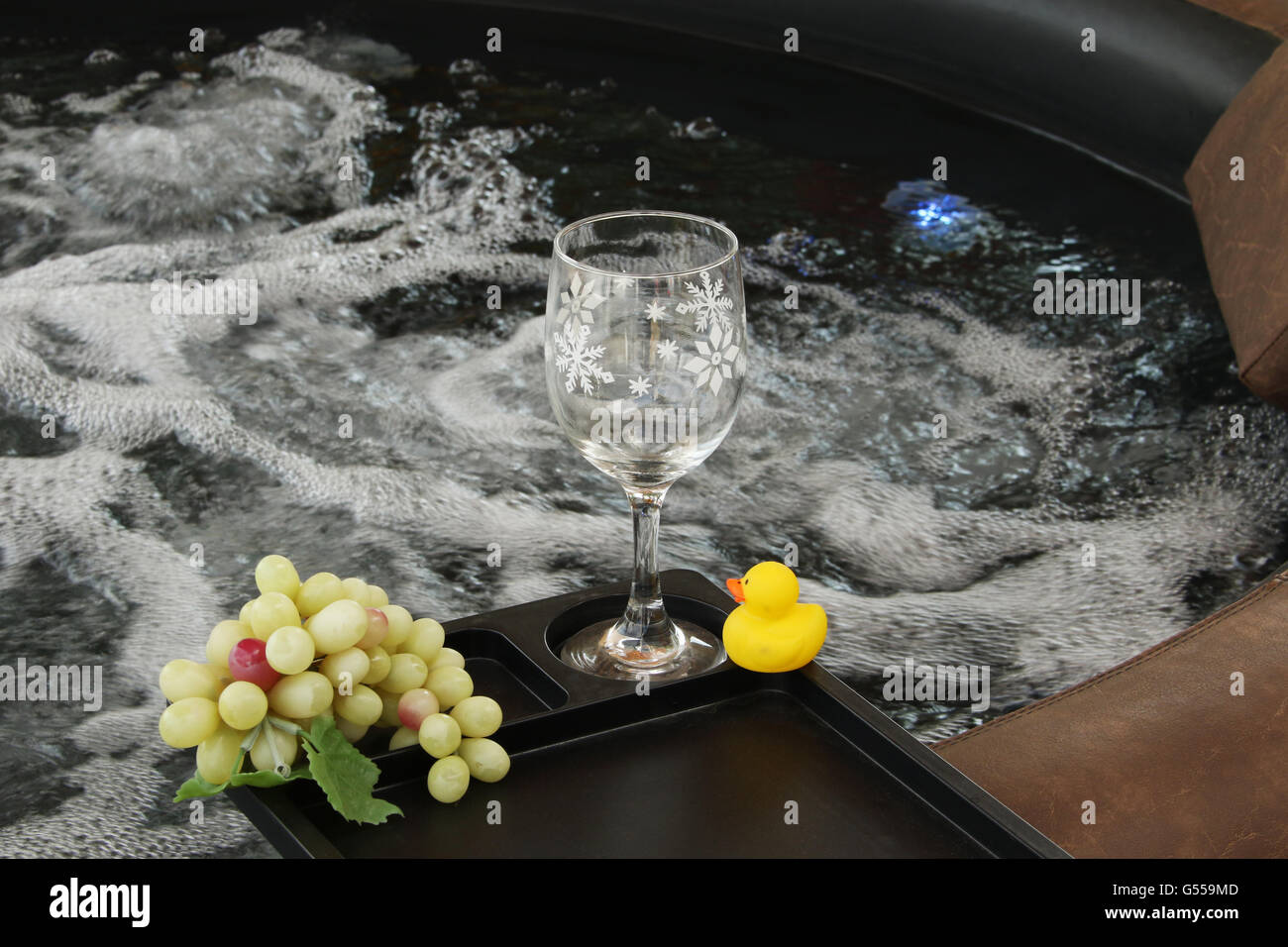 Rubber Duck included. Hot tub with empty plastic wine glass and