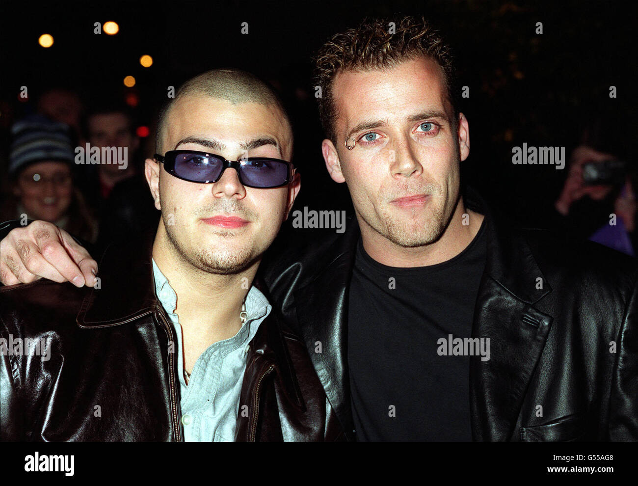 Abs Breen (Richard Breen) and J Brown (Jason Brown), (right) from the boy band Five arriving at the launch party for Irish boy band Westlife's new album, 'Coast to Coast' at St Martin's Hotel in London. Stock Photo