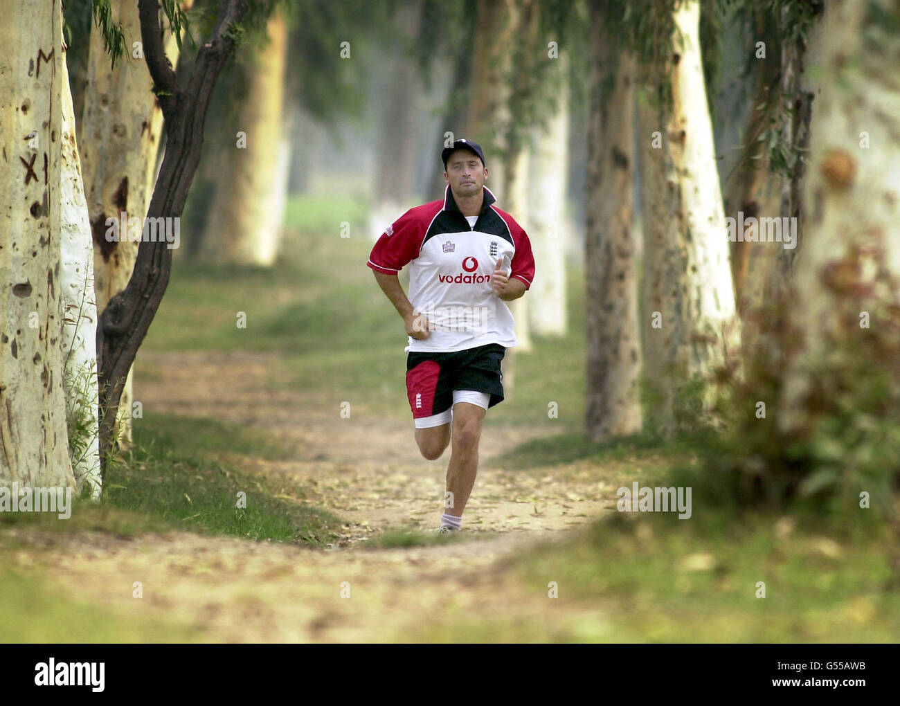 England cricket captain Nasser Hussain enjoys a run through the