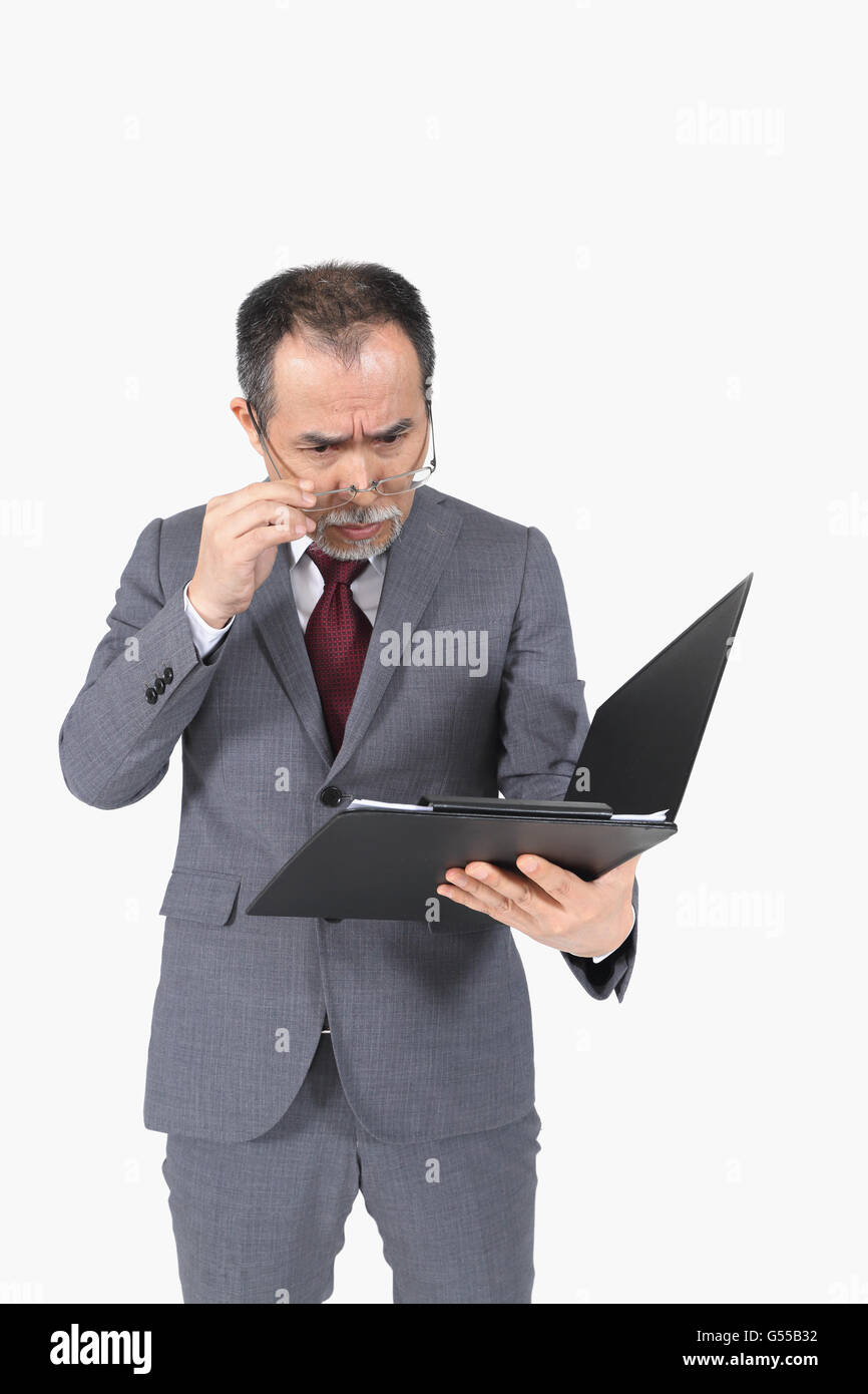 Japanese senior businessman on white background Stock Photo