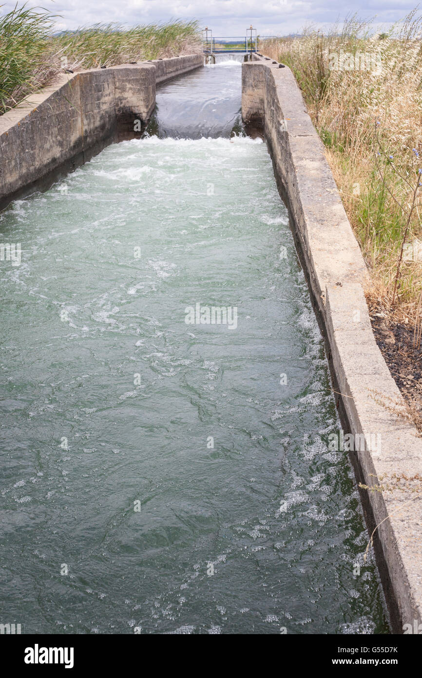 Floodgate area at huge irrigation canal of High Guadiana or Vegas Altas, Extremadura, Spain Stock Photo