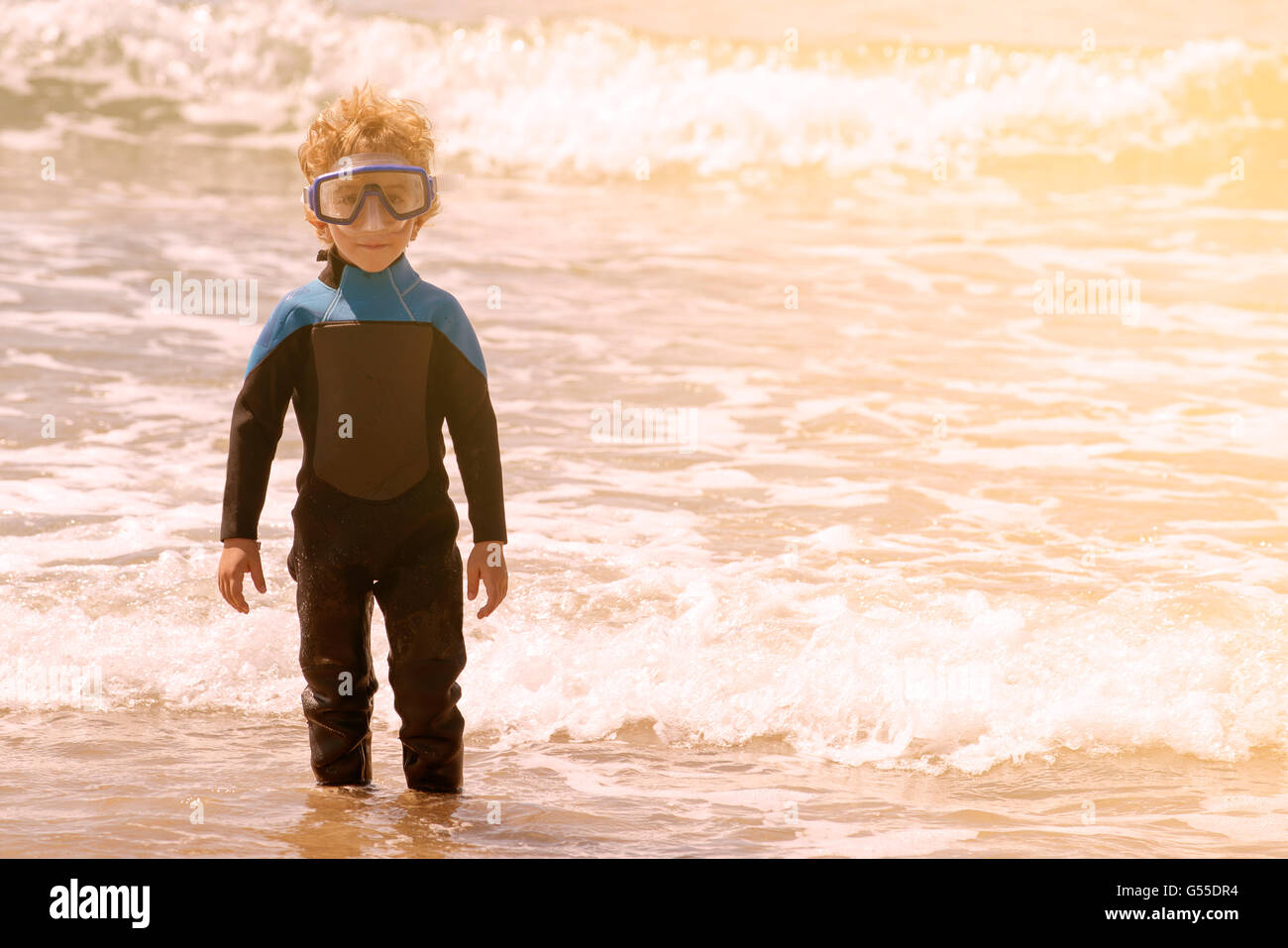 Boy diving into sea hi-res stock photography and images - Alamy