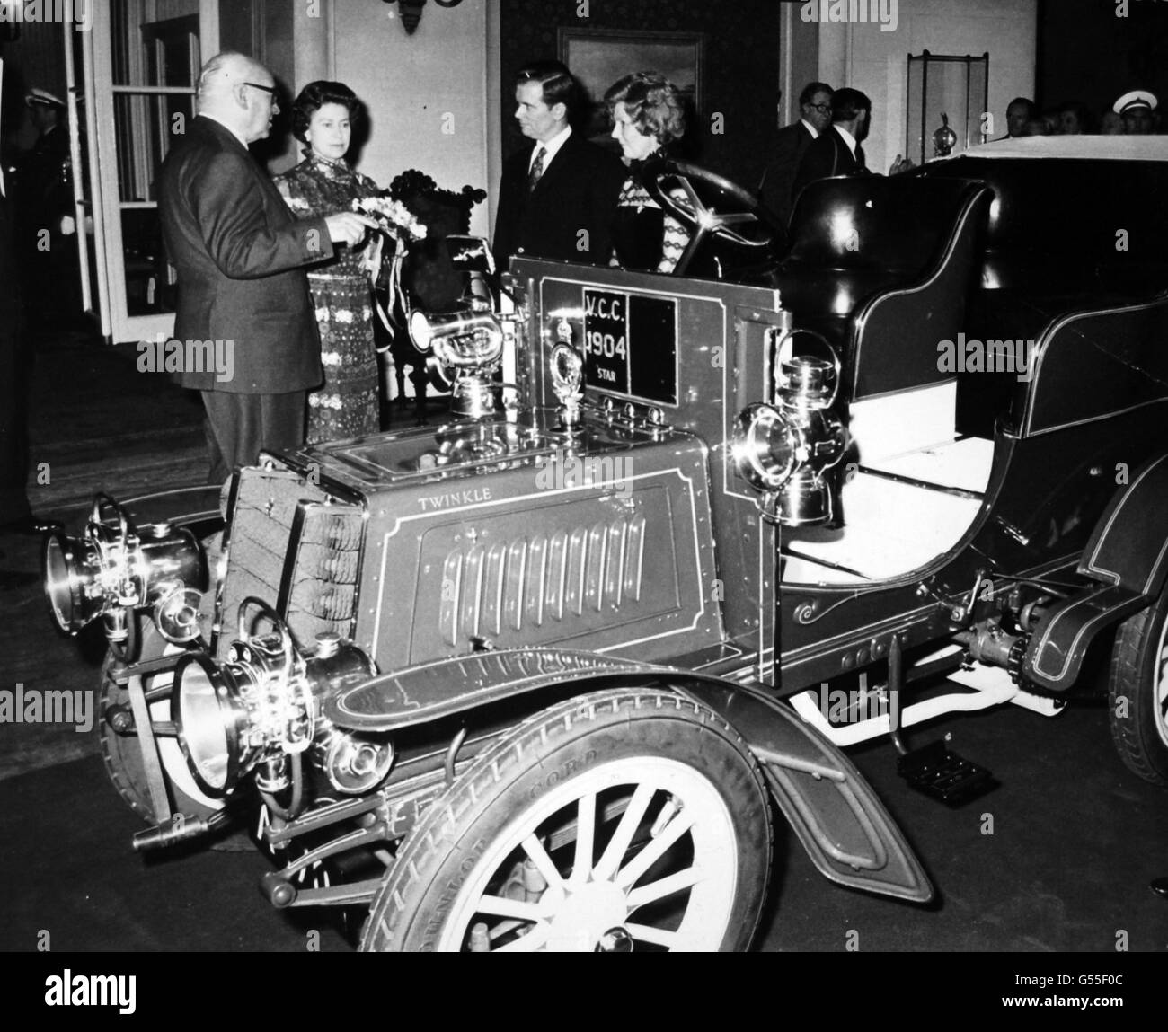 *Scanned low-res from print, high-res available on request* Queen Elizabeth II, Patron the the Royal Automobile Club, visiting the Pall Mall clubhouse in commemoration of the RAC's 75th anniversary. Stock Photo