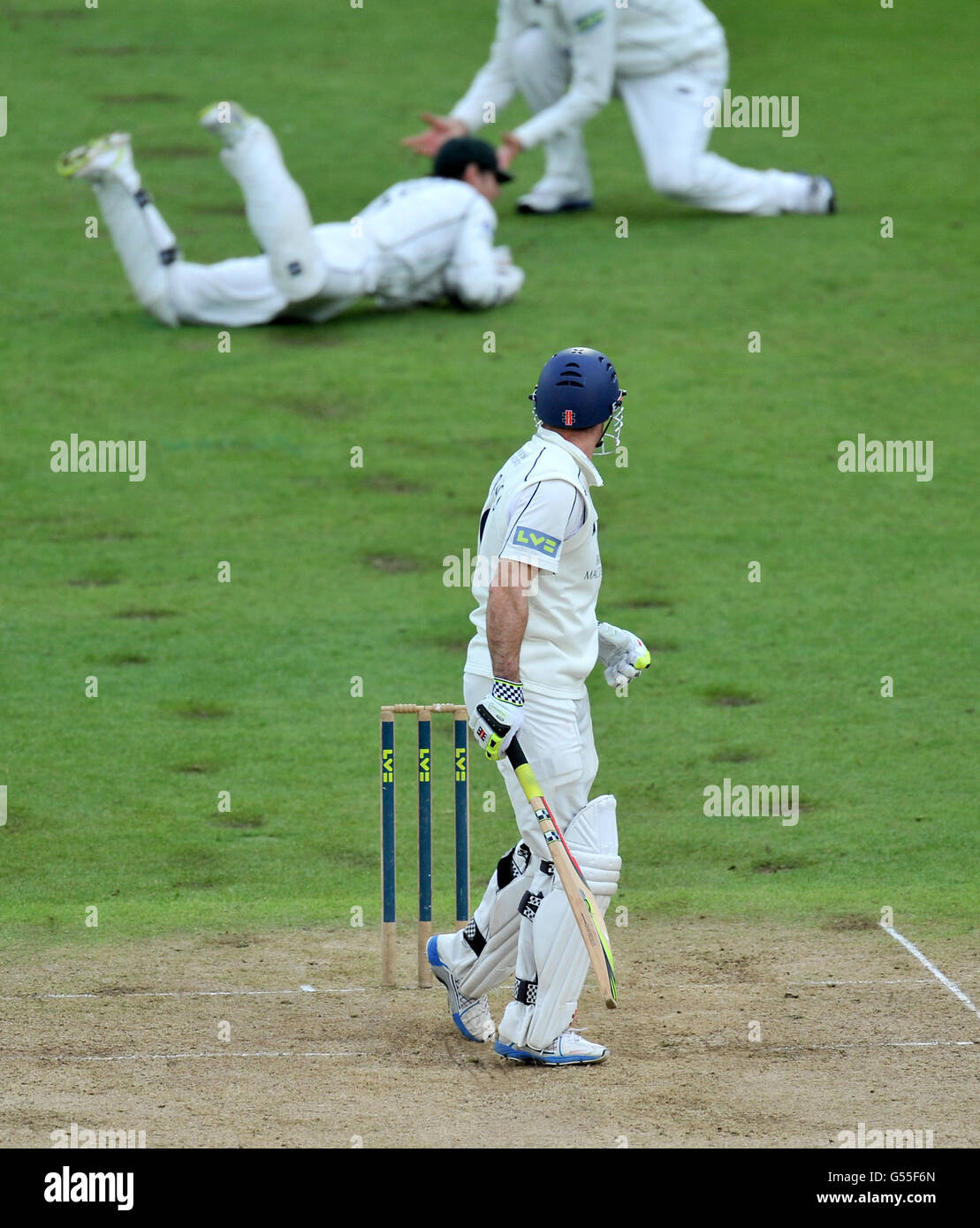 Middlesex's Andrew Strauss watches Nottinghamshire's Chris Read (top left) catch him out off the bowling of Harry Gurney during the LV= County Championship, Division One match at Trent Bridge, Nottingham. Stock Photo
