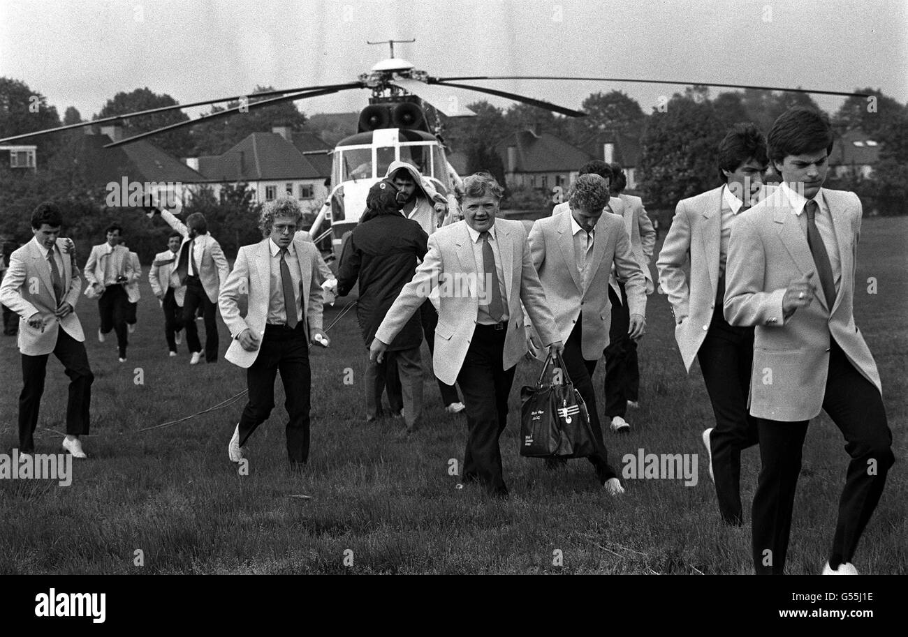 PA PHOTO 21/5/1983 BRIGHTON AND HOVE ALBION FC PLAYERS, LEAVE THE HELICOPTER WHICH BROUGHT THEM FROM PURLEY TO SCHOOL PLAYING FIELDS IN CARLTON AVENUE, EAST WEMBLEY, TO BOARD A COACH FOR THEIR FA CUP FINAL MEETING WITH MANCHESTER UNITED AT WEMBLEY. Stock Photo