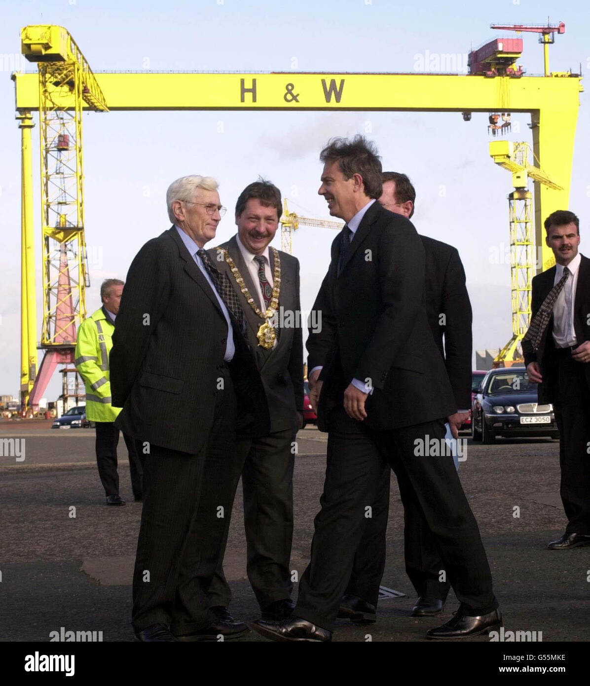 Prime Minister Tony Blair (right) with Northern Ireland Deputy First Minister Seamus Mallon (left) and Belfast Lord Mayor Sammy Wilson at Harland and Wolff shipyard in Belfast on his one-day visit to Northern Ireland. *...Mr Blair today welcomed the announcement that Harland and Wolff has won MoD contracts to build two ferries at its troubled Belfast shipyard. Stock Photo
