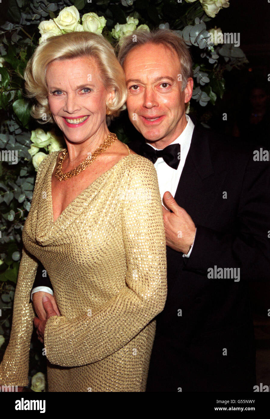 Honor Blackman and Nickolas Grace arrives for the James Bond Gala Night at the Dorchester Hotel, London. Stock Photo