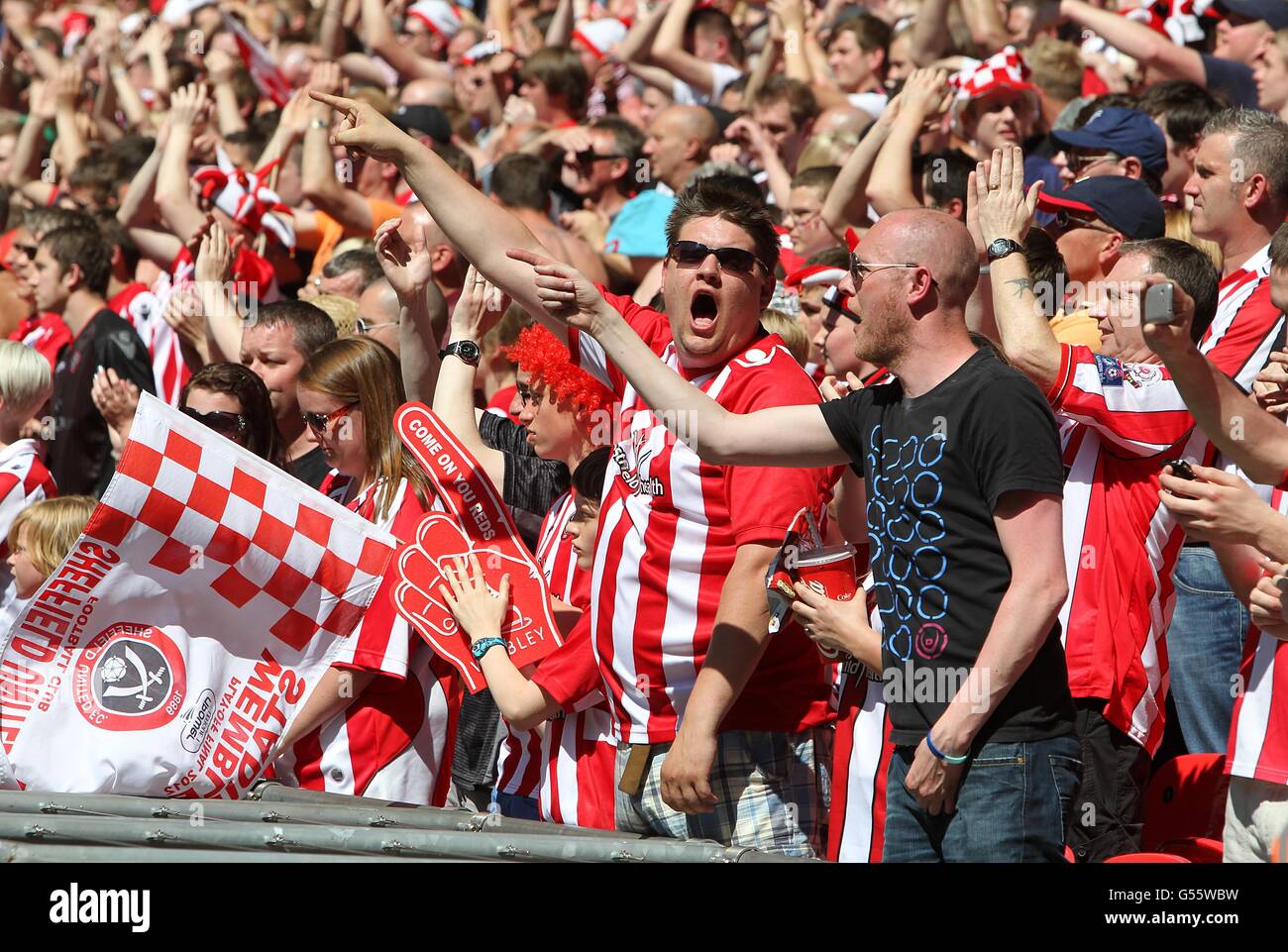 Sheffield united fans cheer on their side in the stands hi-res stock ...