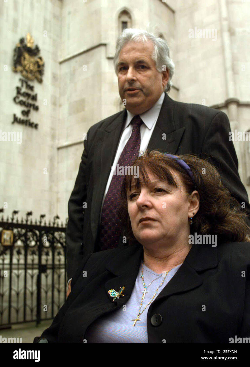 Leaving the High Court are Eddy and Brenda Weatherill, a couple who claimed they were victims of 'fraud and deceit' by a bank manager and failed in their 1 million High Court damages claim against Lloyds TSB. *The couple, whose legal battle is being made into a feature film, alleged that a 'dishonest' manager talked them into remortgaging their Cambridgeshire home to raise capital for their ailing commercial interiors company then grabbed enough money to clear their overdraft and promptly cancelled the facility. See PA News story COURTS Bank. PA photo: Peter J Jordan. Stock Photo