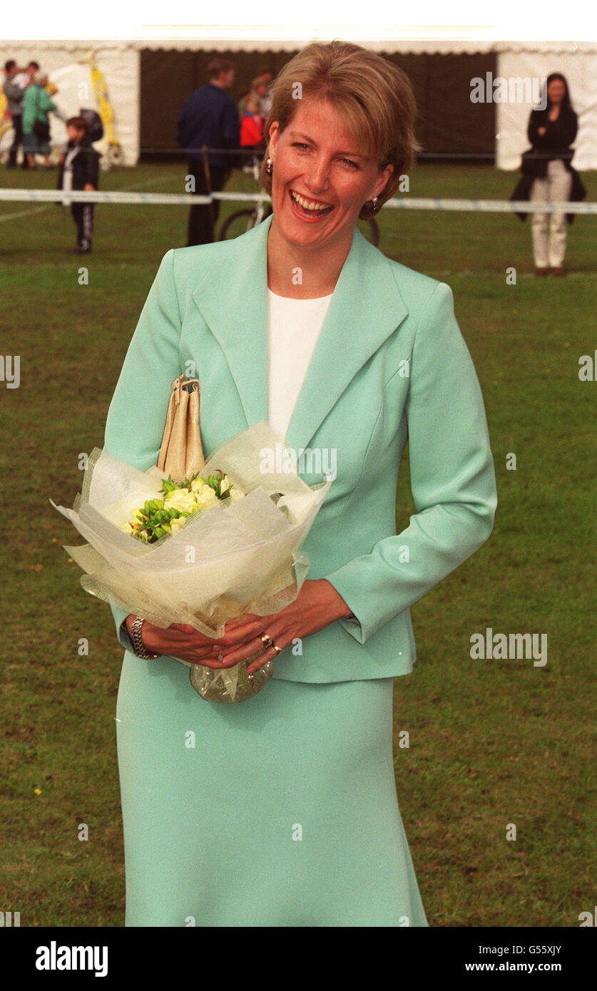 The Countess of Wessex holds flowers during a visit to the