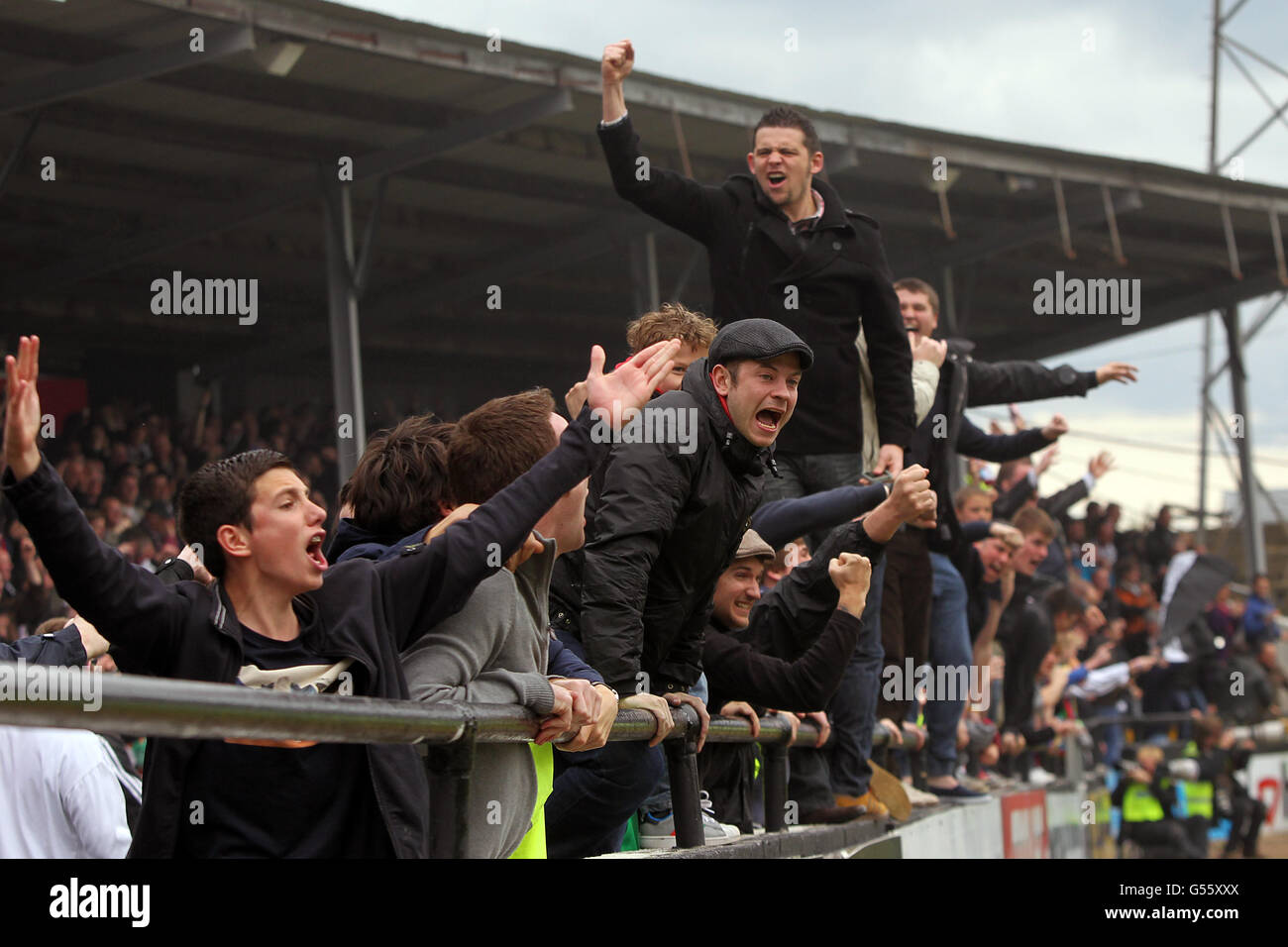 Hereford United fans show their support in the stands Stock Photo - Alamy