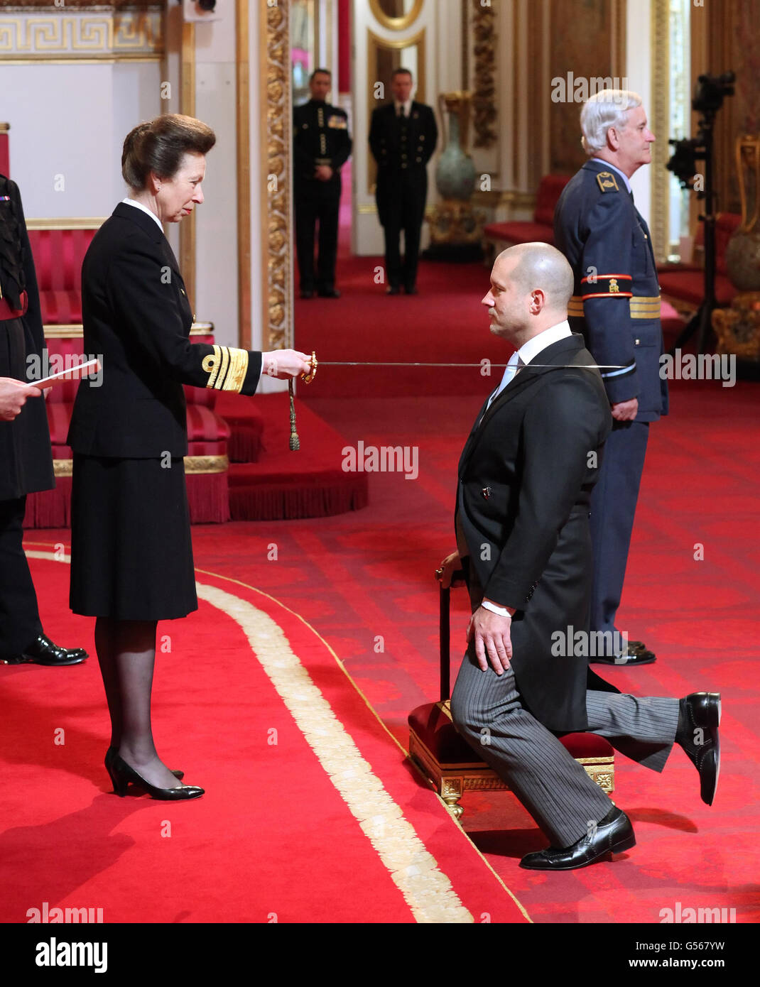 Senior Vice President, Apple Design Inc Sir Jonathan Ive is Knighted by The Princess Royal during an Investiture ceremony at Buckingham Palace. London. Stock Photo