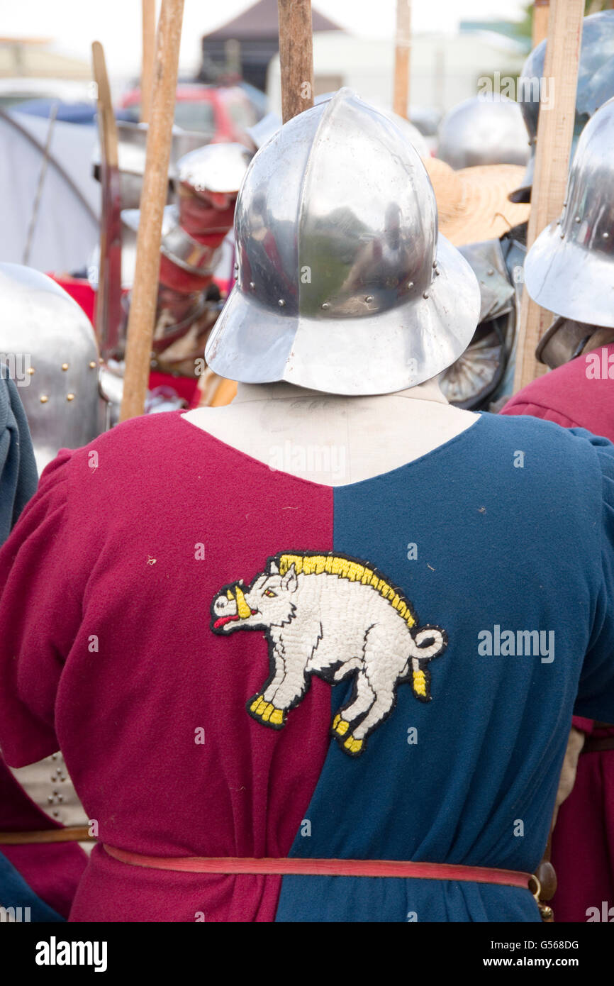 Tewkesbury, UK-July 17, 2015: Boar insignia on jerkin worn by soldier in armour on 17 July 2015 at Tewkesbury Medieval Festival Stock Photo