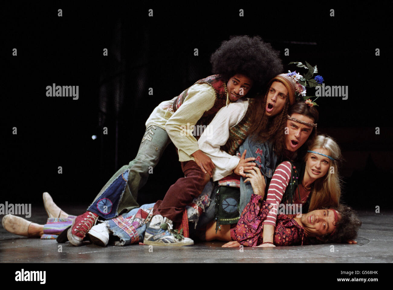The cast of the musical 'Hair' got to know each other during rehearsal's at the Old Vic in London. (L-R) Paul Medford, Unknown, John Barrowman, Andree Bernard and Paul Hipp. Stock Photo