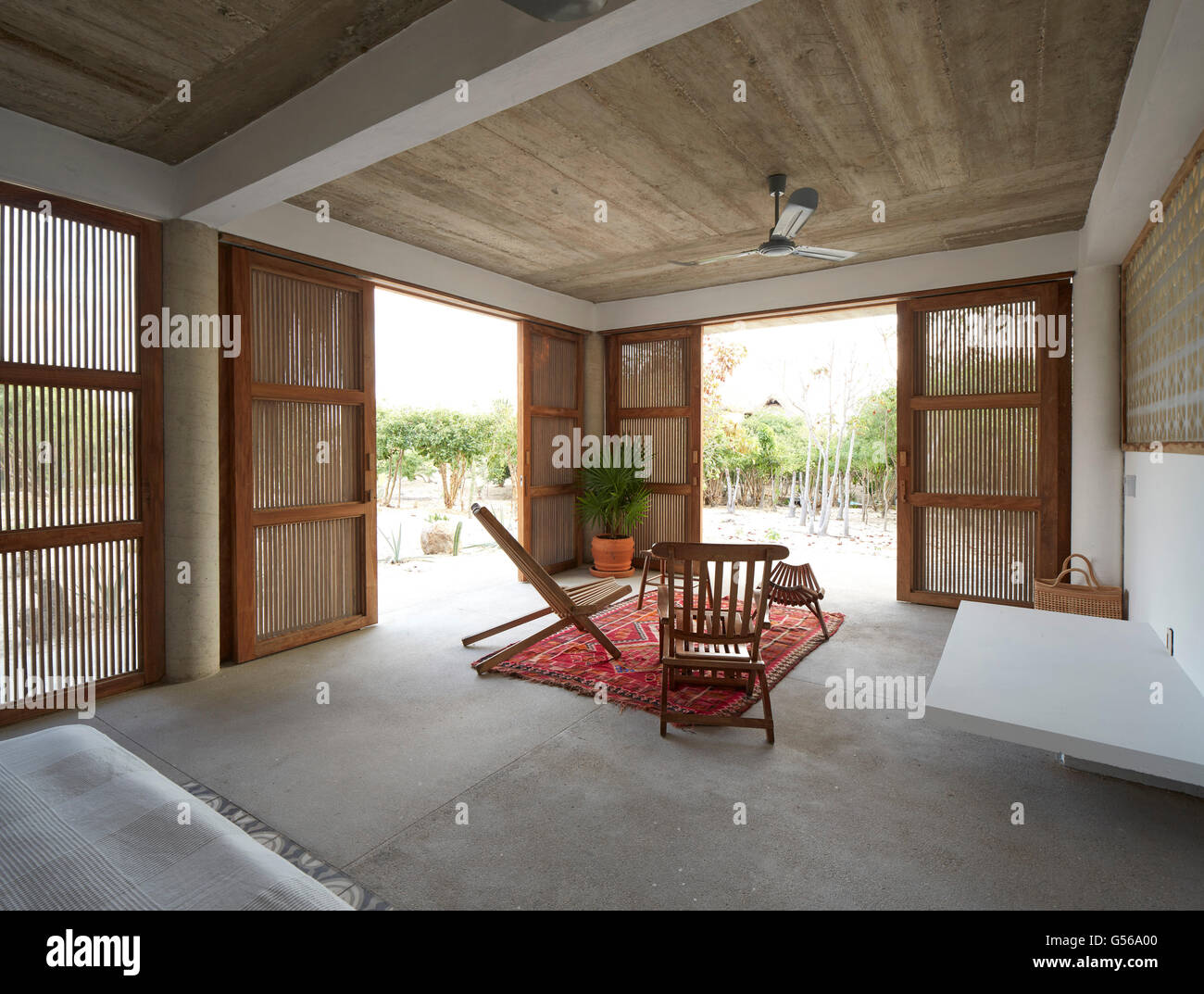 Lower level bedroom. Casa Cal, Puerto Escondido, Mexico. Architect: BAAQ, 2015. Stock Photo