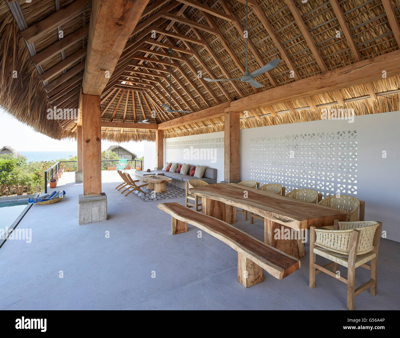 Covered area on upper level from under palapa. Casa Cal, Puerto Escondido, Mexico. Architect: BAAQ, 2015. Stock Photo