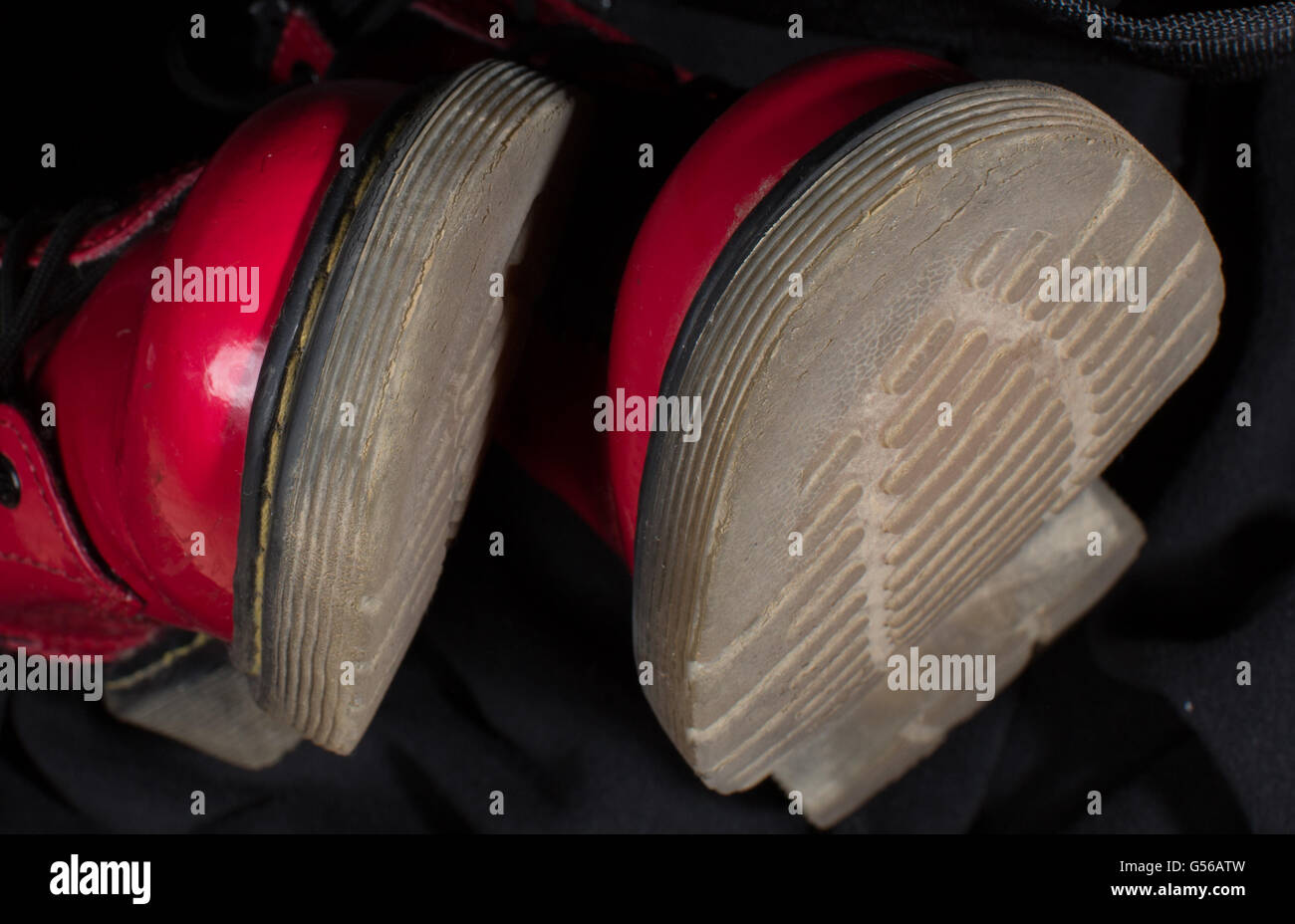 The soles of a pair of used Dr Martens boots Stock Photo