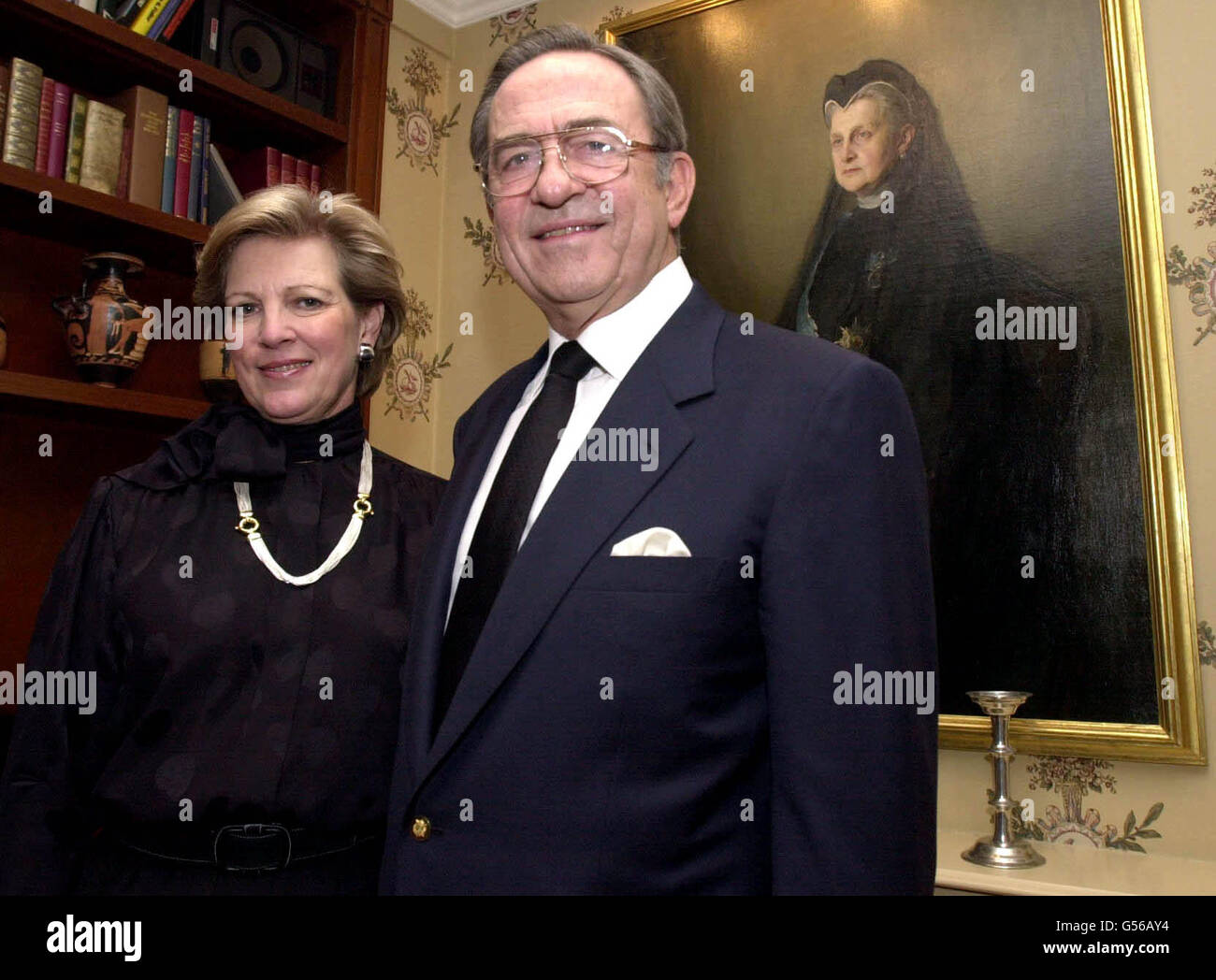 King Constantine of Greece with wife Queen Anne-Marie at their home in north London. The exiled king is 'extremely grateful' after the European Court of Human Rights ruled that Constantine's human rights had been violated when his property was seized in Greece. *... They are in front of a portrait of his Great Grandmother Queen Olga who is also the Grandmother of Britain's Prince Philip. Stock Photo