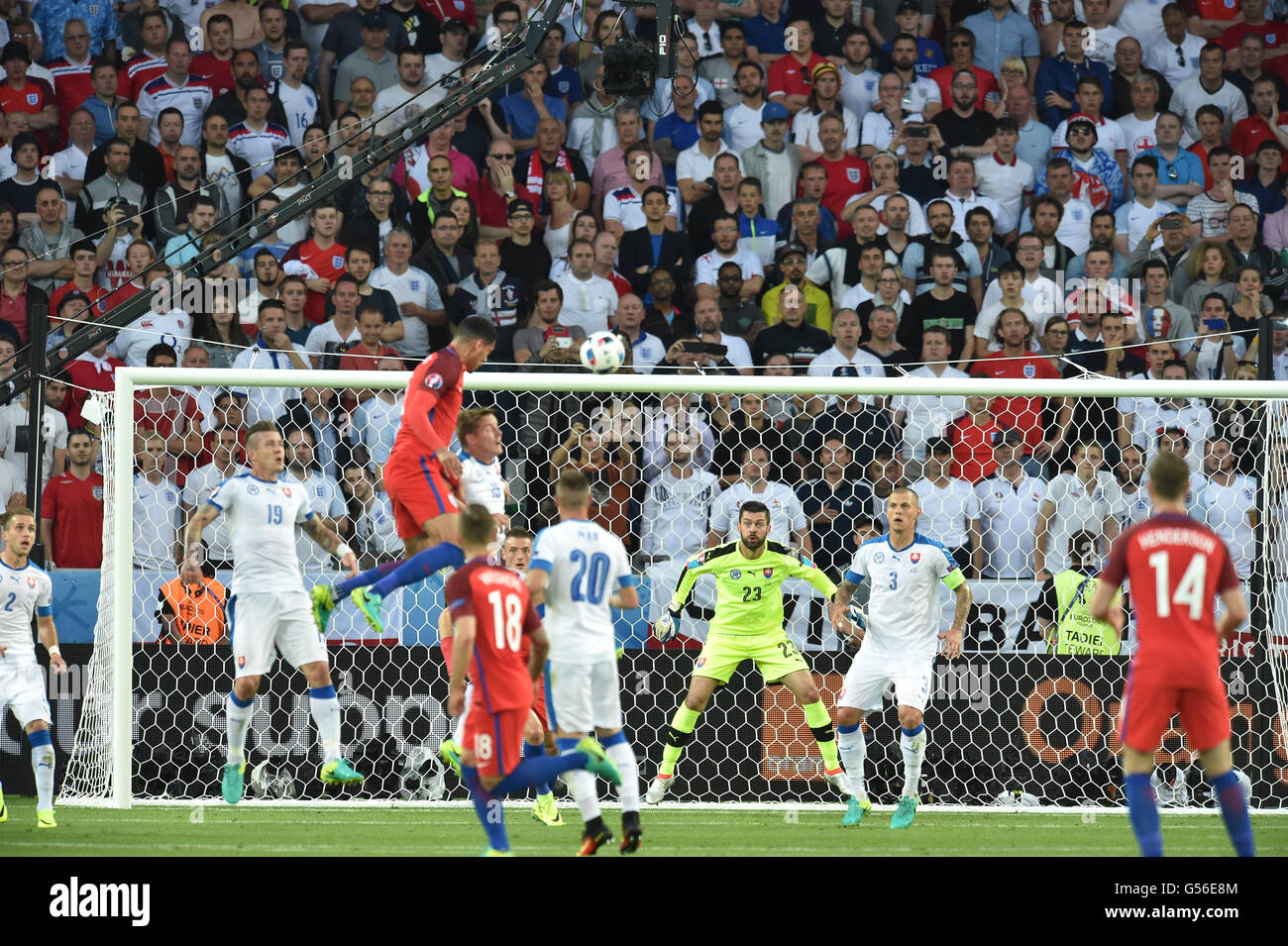 Stade Geoffroy-Guichard, St Etienne, France. 20th June, 2016. Group B match between Slovakia and England at Geoffroy Guichard stadium in Saint-Etienne, France, 20 June. Smalling wins the header in the Slovakia box to put pressure on the Slovak defense Credit:  Action Plus Sports/Alamy Live News Stock Photo