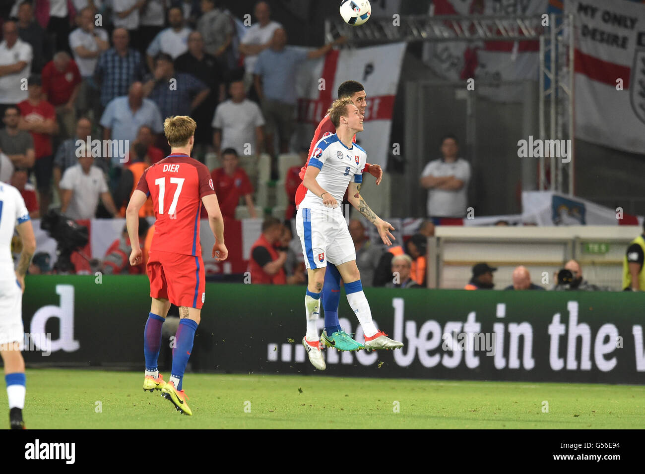 Stade Geoffroy-Guichard, St Etienne, France. 20th June, 2016. Group B match between Slovakia and England at Geoffroy Guichard stadium in Saint-Etienne, France, 20 June. ondrej duda (slo) challenges ryan bertrand (Eng) for the header Credit:  Action Plus Sports/Alamy Live News Stock Photo