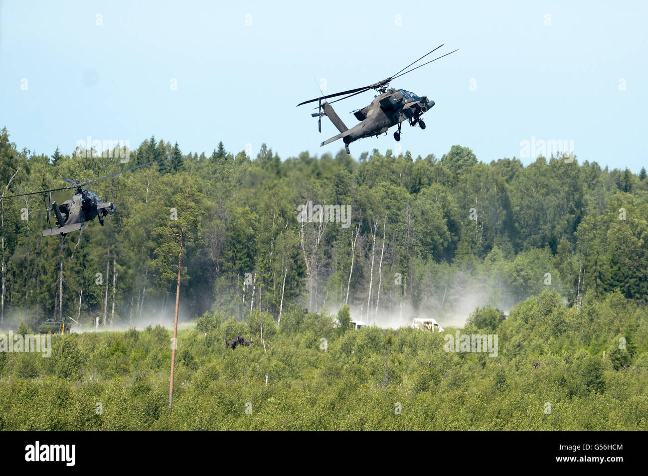 Tapa. 20th June, 2016. US Air forces AH-64 Apache helicopters participate in Saber Strike military exercise at Central pylon in Tapa, Estonia on June 20, 2016. Saber Strike is an annual U.S.-led exercise of land and air forces. © Sergei Stepanov/Xinhua/Alamy Live News Stock Photo