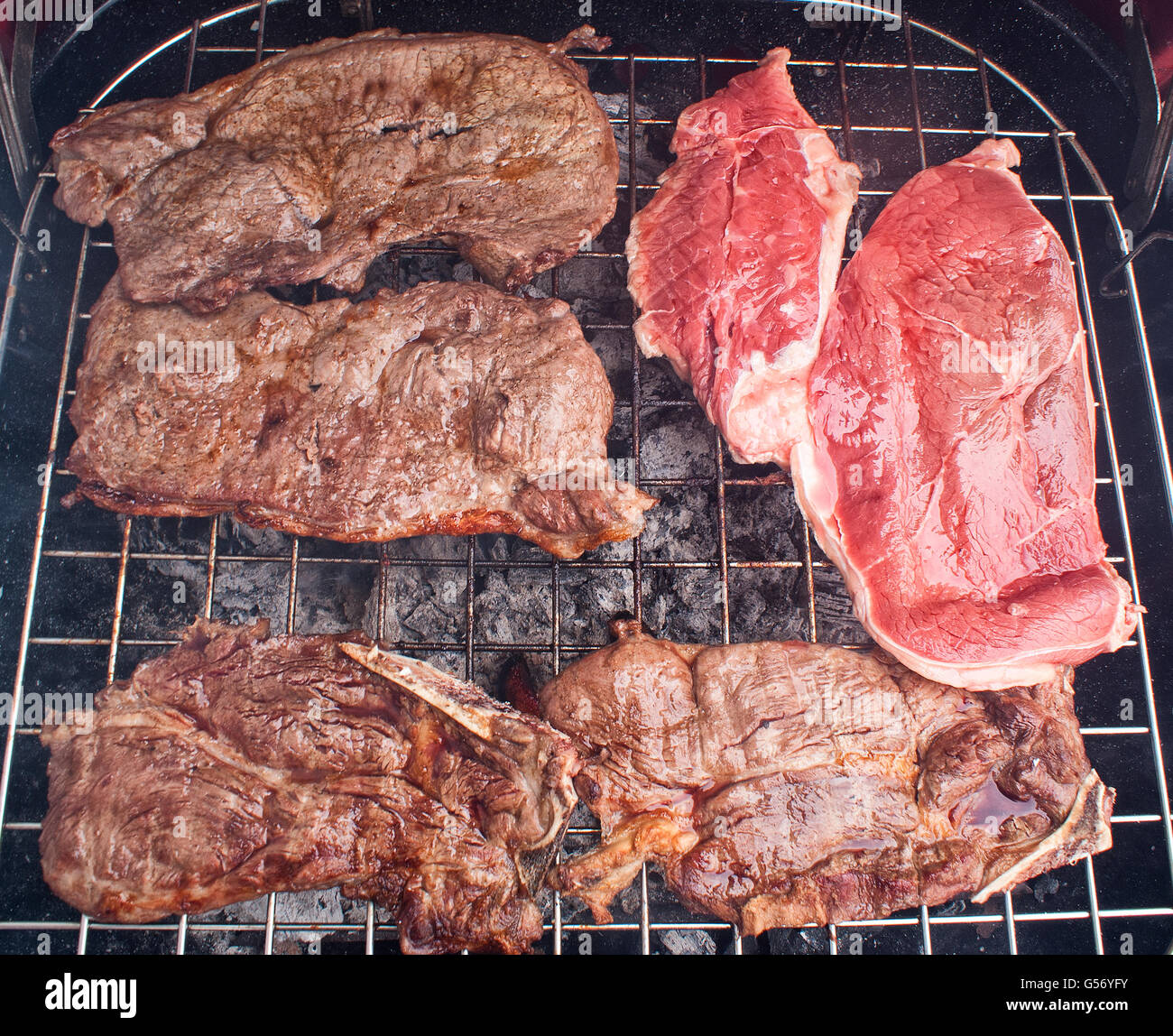 Photograph of some grilled meat juicy steaks Stock Photo Alamy