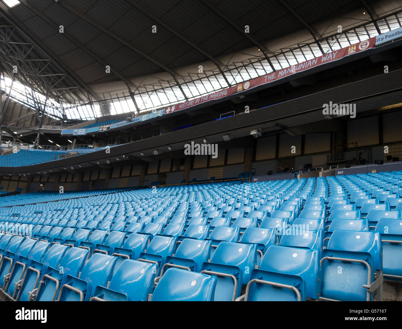 Seats inside Etihad Stadium Manchester CIty Football Club UK Stock Photo