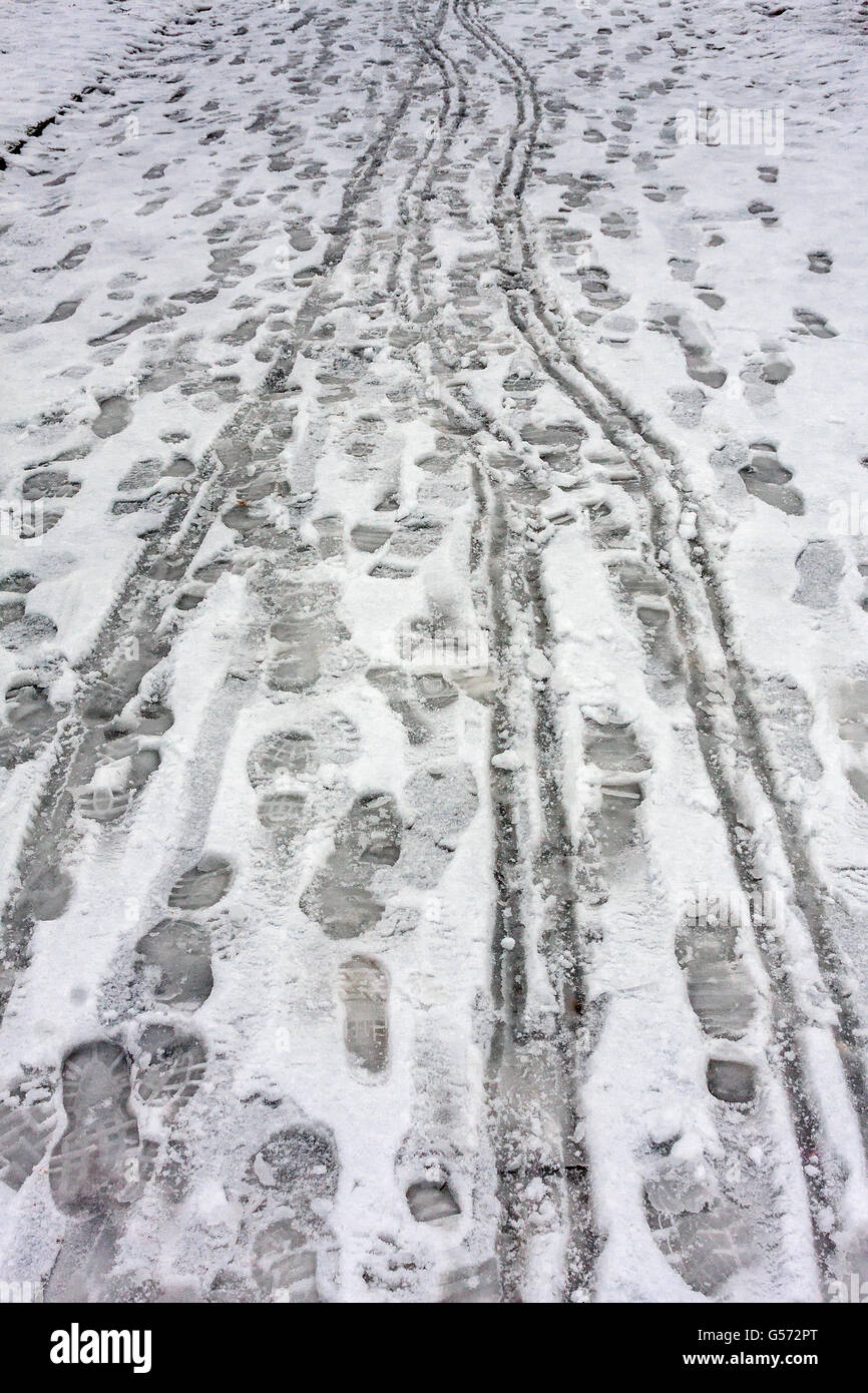 Footprint on the snow Stock Photo - Alamy